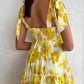 Yellow daisy halter dress