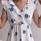 White sleeveless blue flower dress